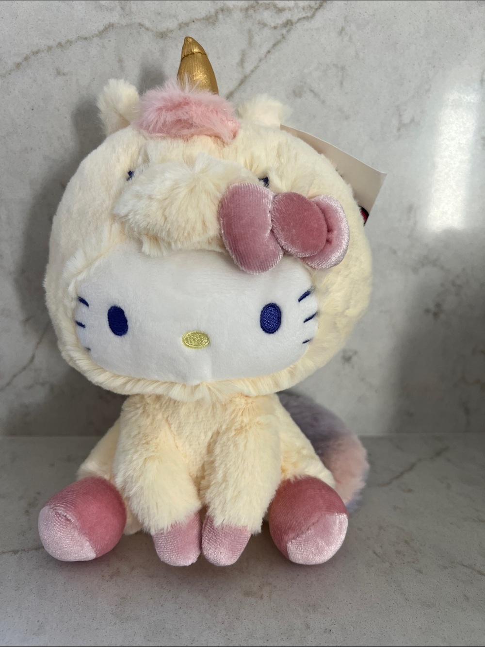 Hello Kitty cuddly pastel yellow unicorn with rainb  Premium Stuffed Animal, 6"